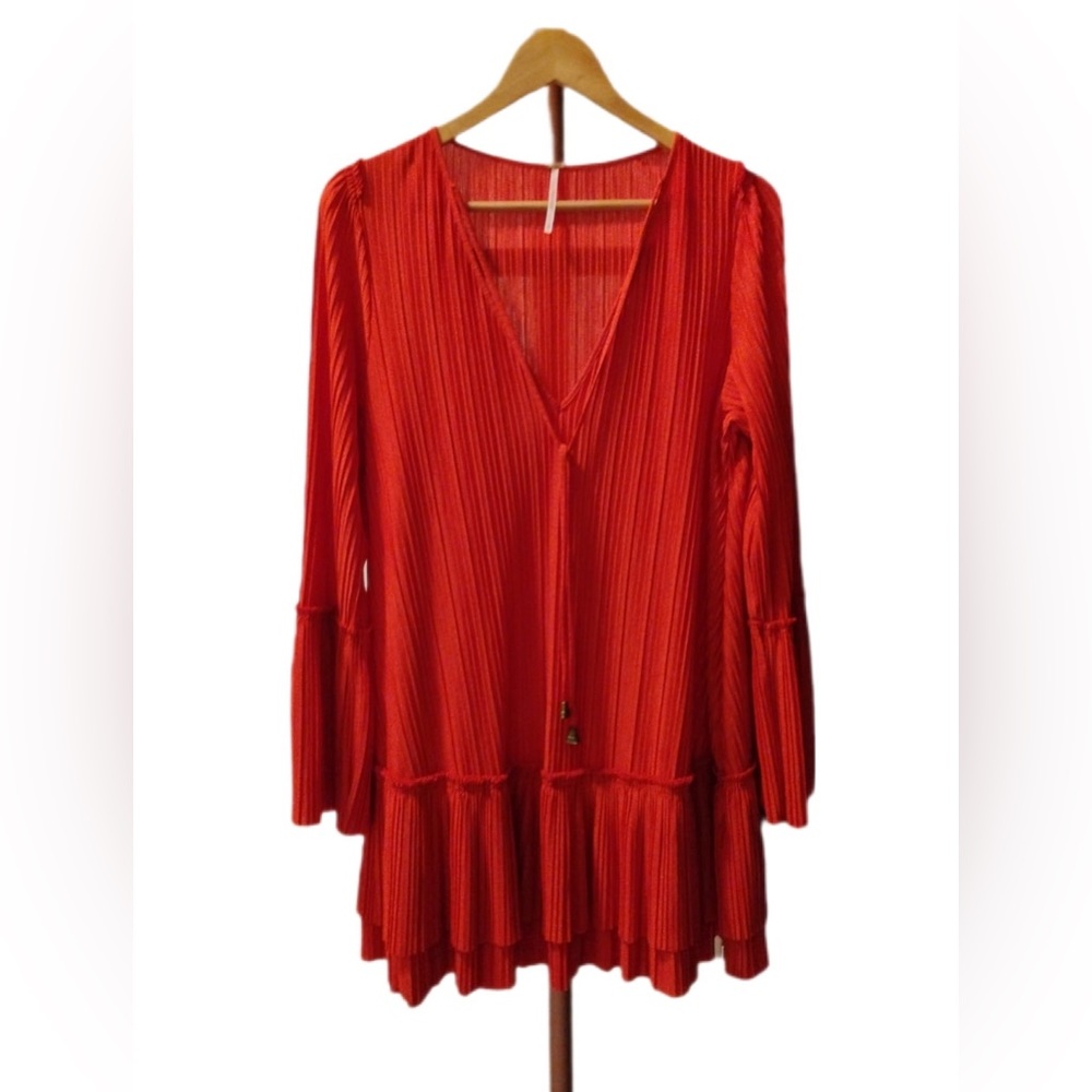 Free people size small/petite. Worn once very roomy beautiful piece.